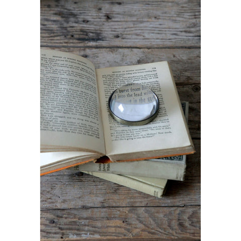 Paperweight and Magnifying Glass