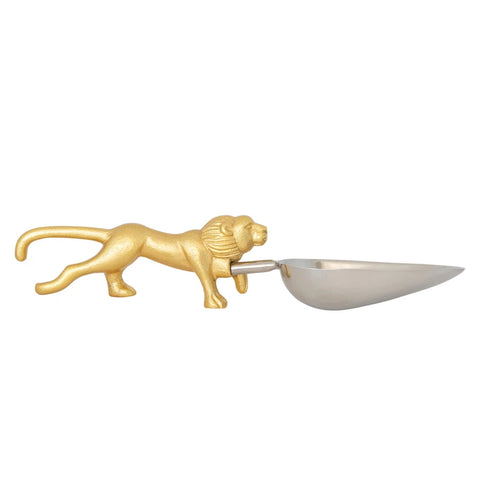 Gold lion-shaped scoop on a white background