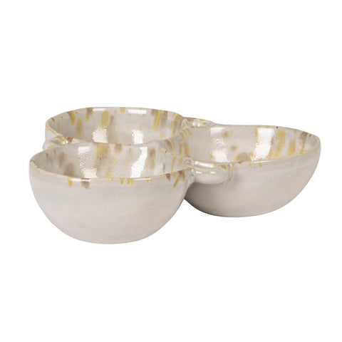 Ceramic bowl with gold accents on a white background