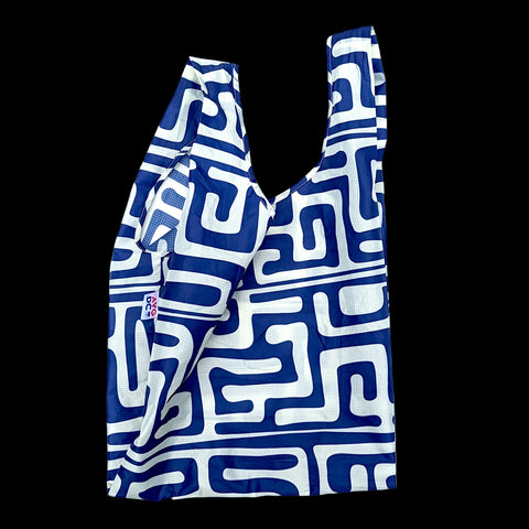 Blue and white patterned bag on a white background