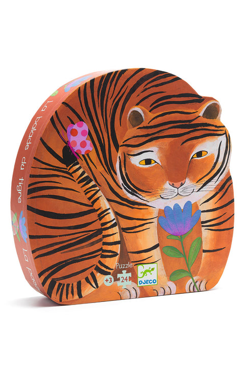 A puzzle box shaped like a tiger with a colorful striped pattern, featuring images of sun, flowers, birds, and monkeys on its surface.